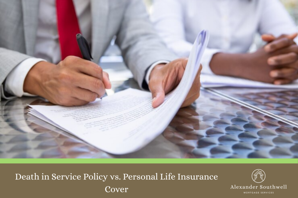 A person in a suit signing documents during a meeting with Alexander Southwell Mortgage Services